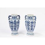 A pair of blue and white small vases. China, 19th c.
