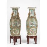 A large pair of Famille Rose Canton vases. China, 19th c.
