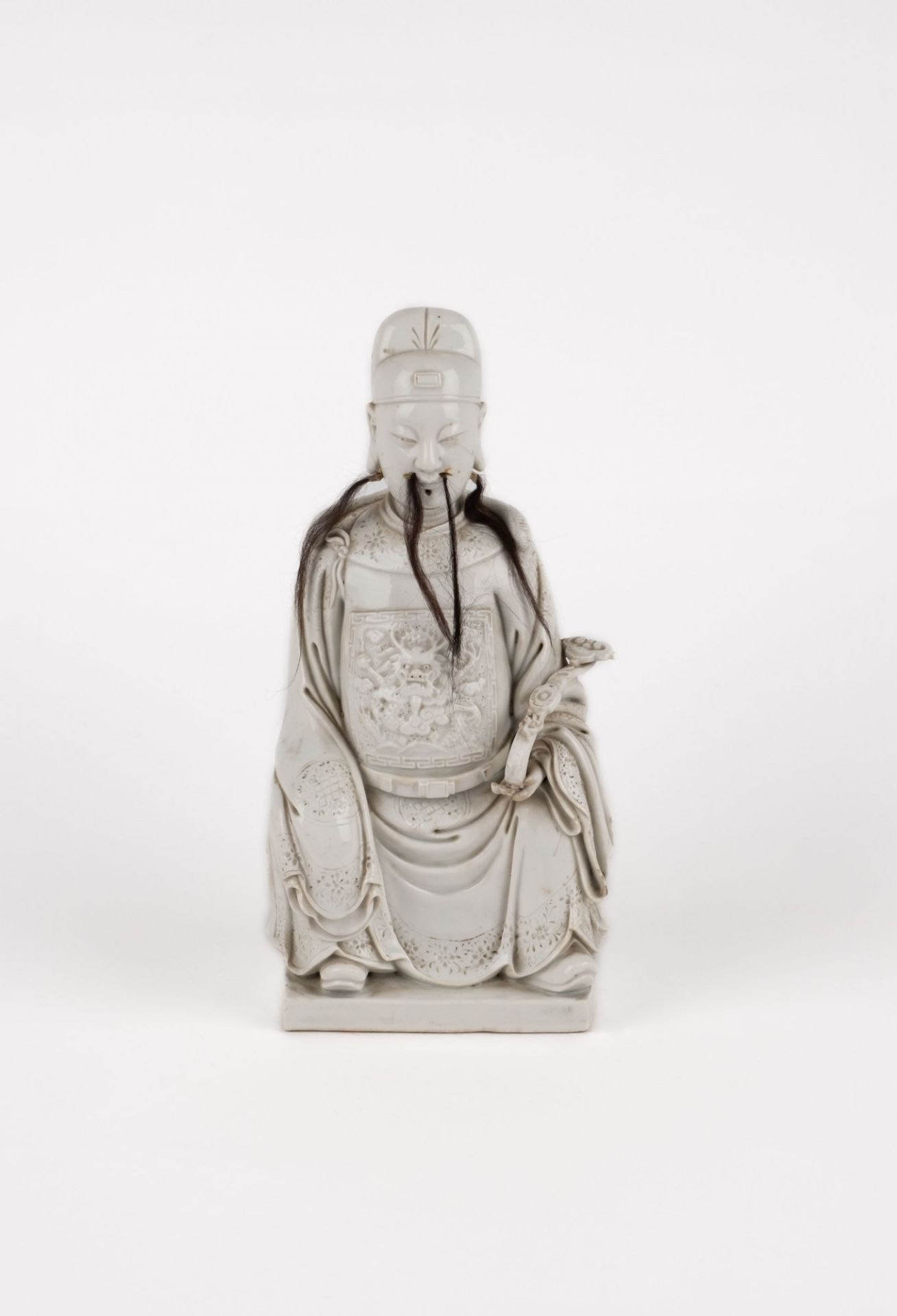 A Blanc de Chine seated figure. China, 19th c.