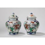 A pair of wucai vases with covers. China, late Qing dynasty/ Republic Period (1912-1949)
