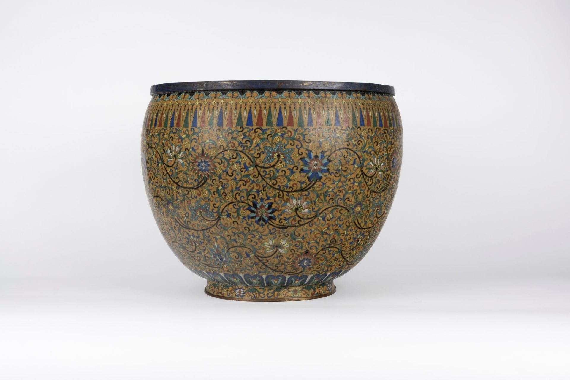 A large cloisonné enamel flowerpot. China, late 19th c.