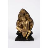 An antique bronze seated Buddha