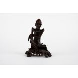A boxwood ascetic buddha. China, 19th c.