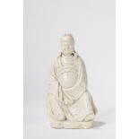 A Blanc de Chine seated figure. China, 19th c.