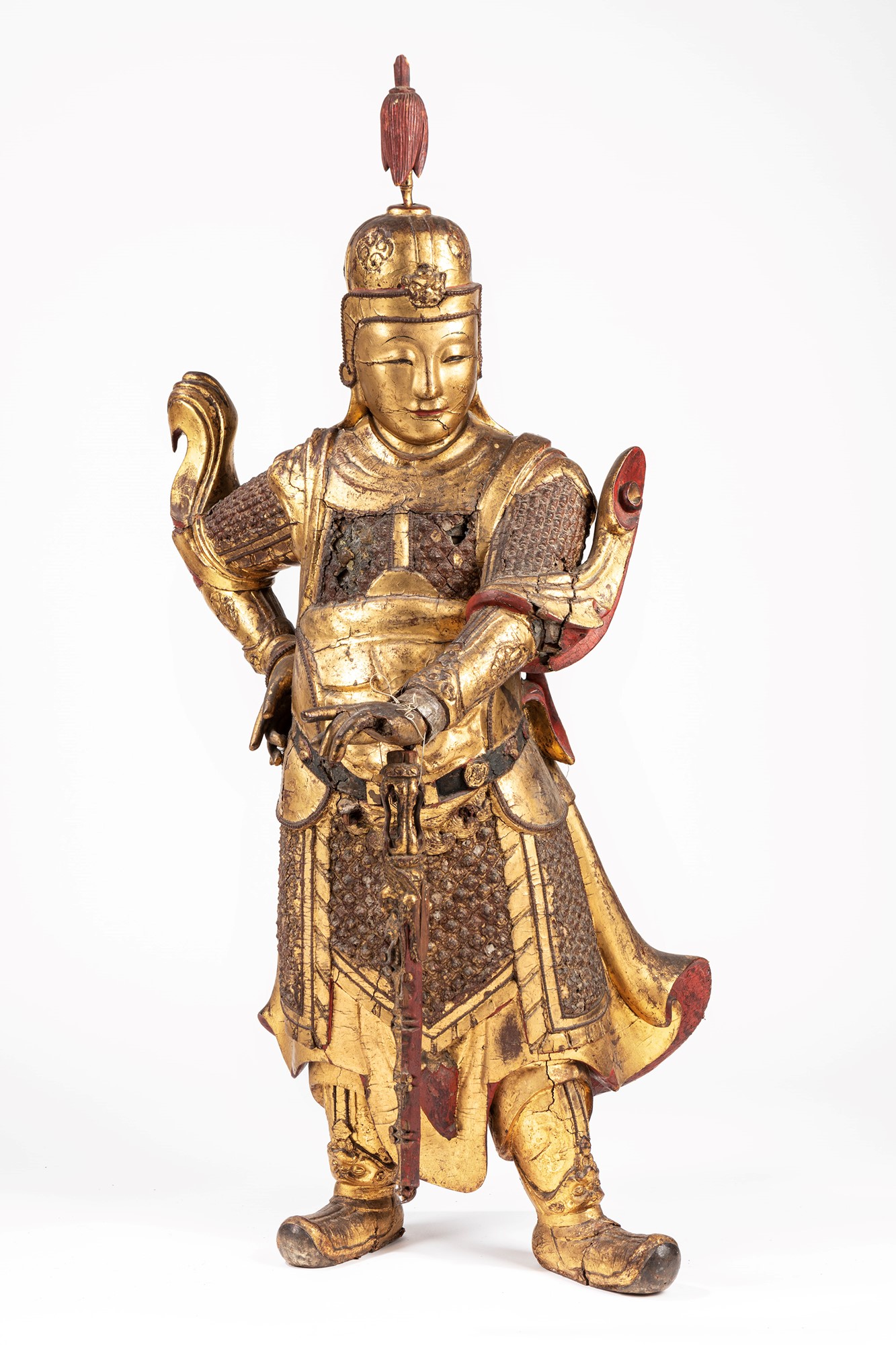 A large carved gilt wood standing figure of Wei Tuo. China, 17th c.