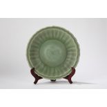 A celadon plate. China, late Yuan dynasty/ early Ming dynasty