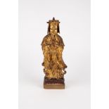 An antique gilt bronze figure