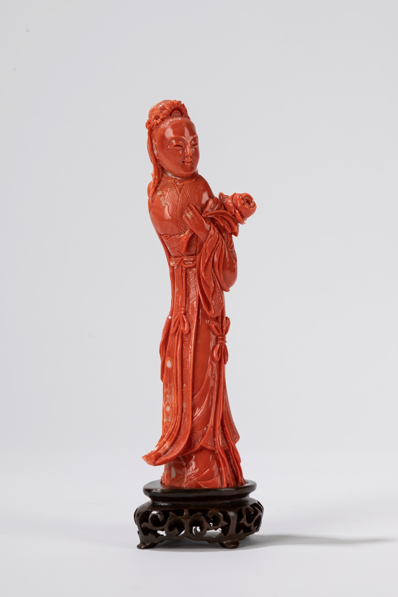 ☼ A coral carving of a guanyin. China early 20th c.
