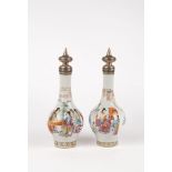 A pair of Famille Rose bottle vases. China, 20th c.