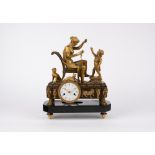 A gilt bronze and black marble mantel clock, early 19th c.