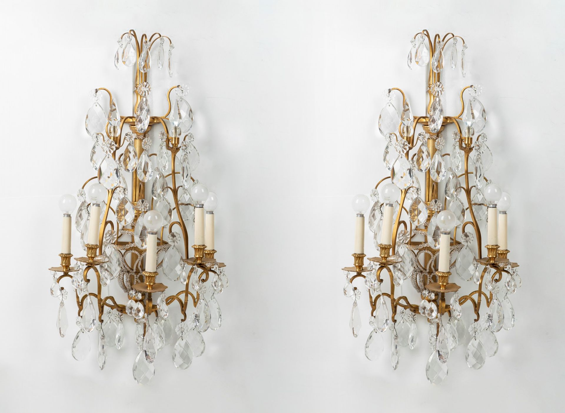 Pair of gilded bronze and crystal appliques. France 20th century