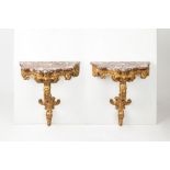 A pair of carved and gilt-wood wall consoles. France 18th/19th c.