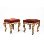 Pair of carved and gilded wooden stools. XVIII century