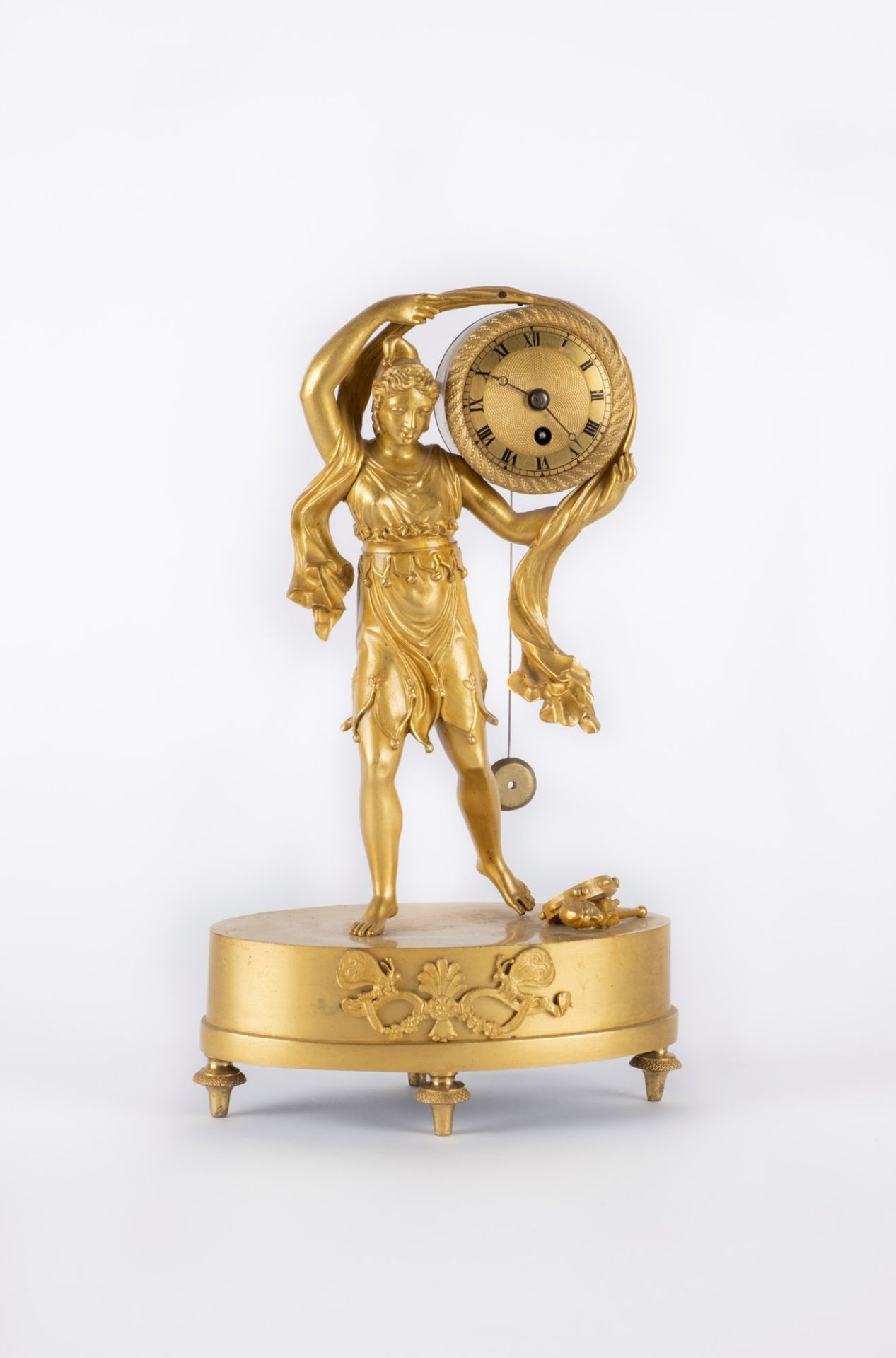 A gilt bronze clock. France, early 19th c.