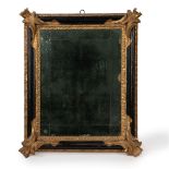 Mirror in black and gold lacquered wood, 18th century