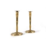 Pair of Empire candlesticks in gilded bronze, early 19th century