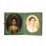 Two miniatures representing a portrait of a lady and a portrait of a gentleman, in a case, 18th-19th