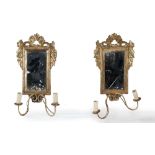 Pair of carved and gilded wood mirrors, 18th century