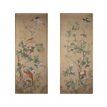 Pair of oriental-style panels painted on fabric representing birds and flowers, early 20th century