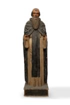 Sculpture representing a saint in painted wood, 14th-15th centuries