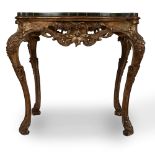 Carved and gilded wooden table with non-coeval faux marble top, 19th-20th centuries