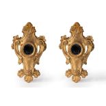 Pair of carved and gilded wooden mirrors, 18th century