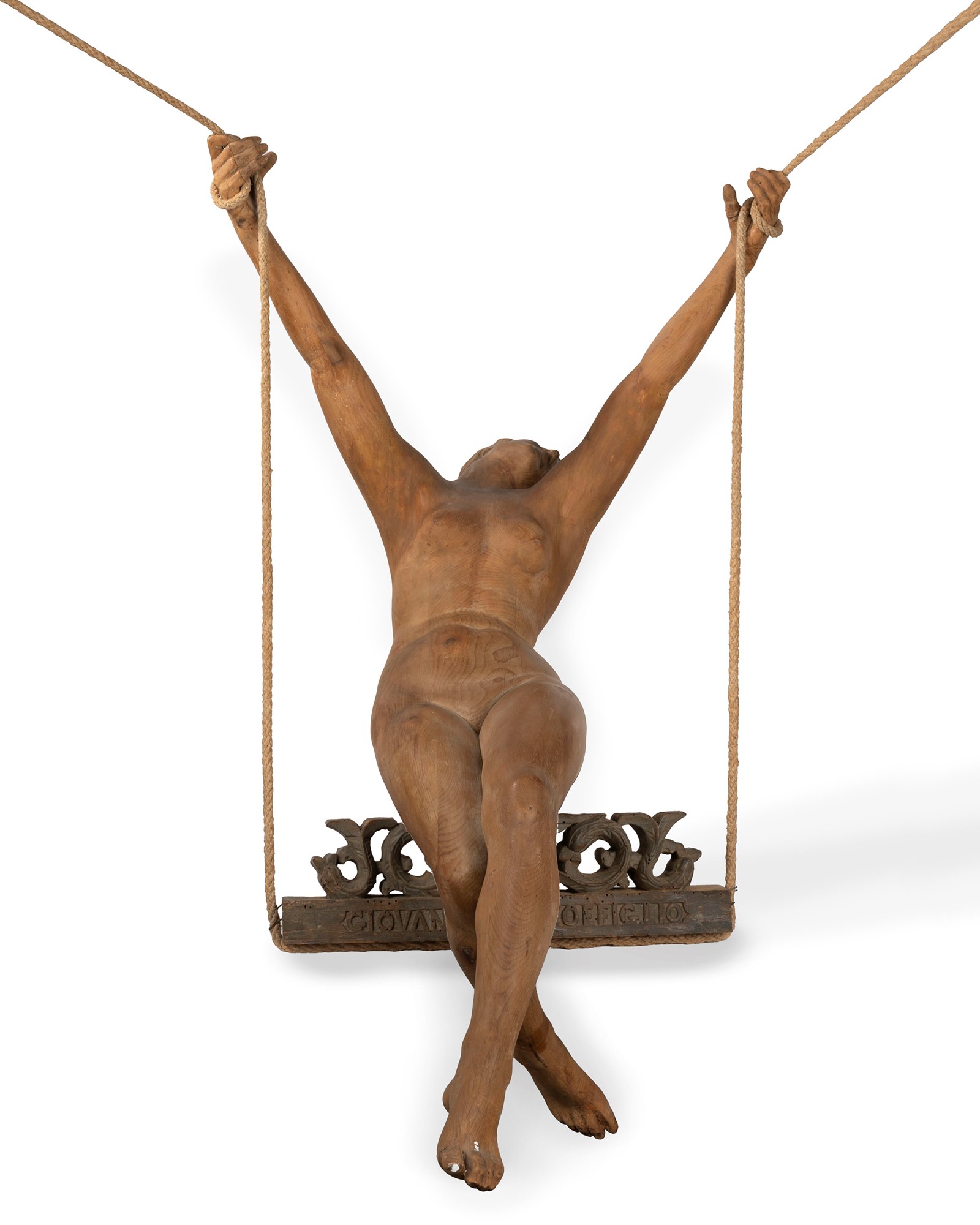 Wood sculpture representing a naked woman on a swing, 20th century