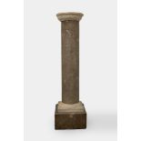 Ancient marble column with marble base