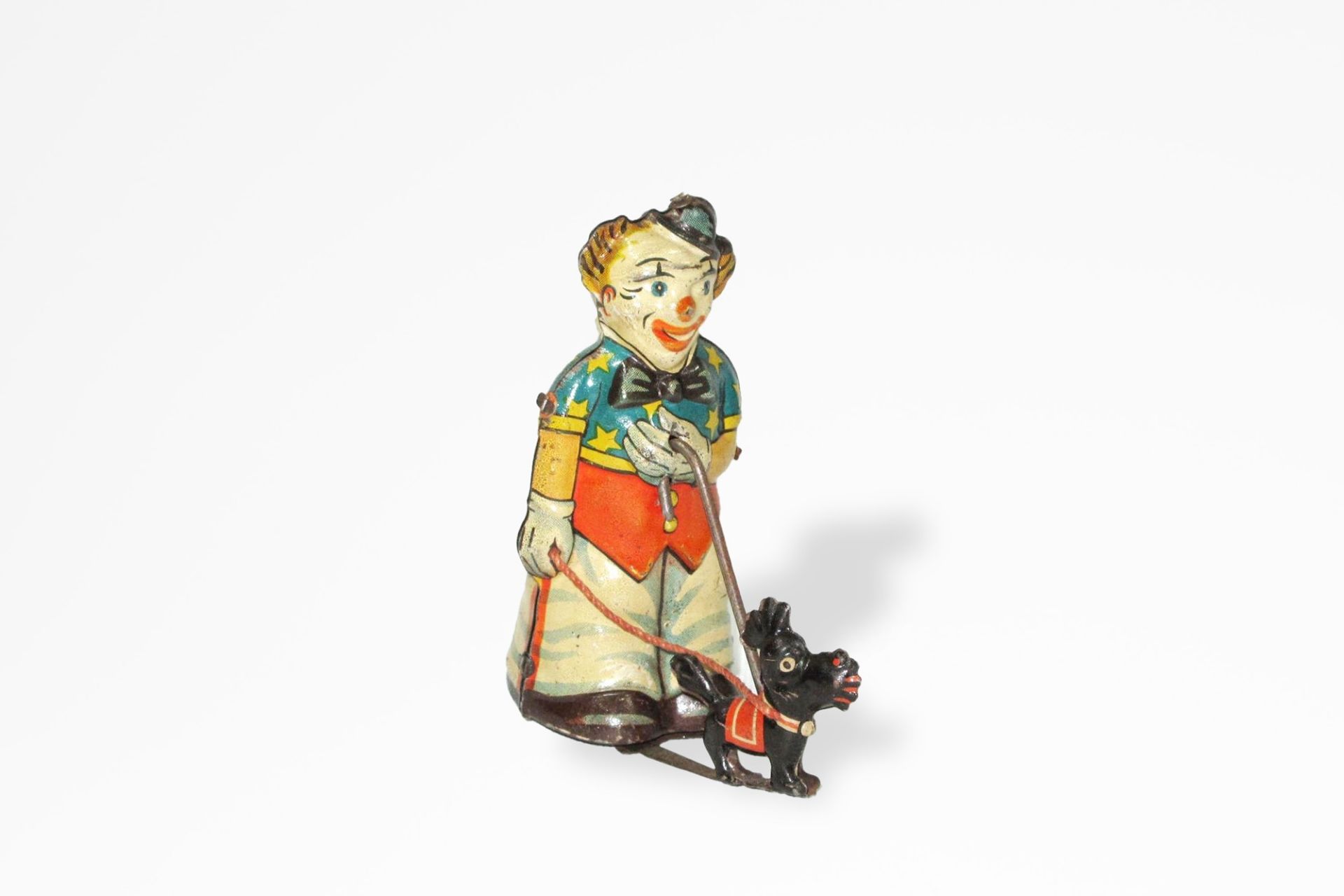 N.B.N. - Clown with dog, 1930