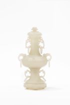 A FINELY CARVED WHITE JADE VASE AND COVER, China, 20th century