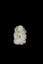 A WHITE JADE FIGURE, China, Qing dynasty, 19th century