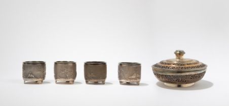 FOUR SILVER CANDLE-HOLDERS AND A SILVER BOX, d max cm 8