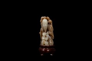 A CARVED TWO TONE JADE FIGURE OF SHOULAO, China, Qing dynasty, 19th century