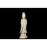 A LARGE PALE CELADON JADE FIGURE OF A STANDING GUANYIN, China, Qing dynasty, 19th century