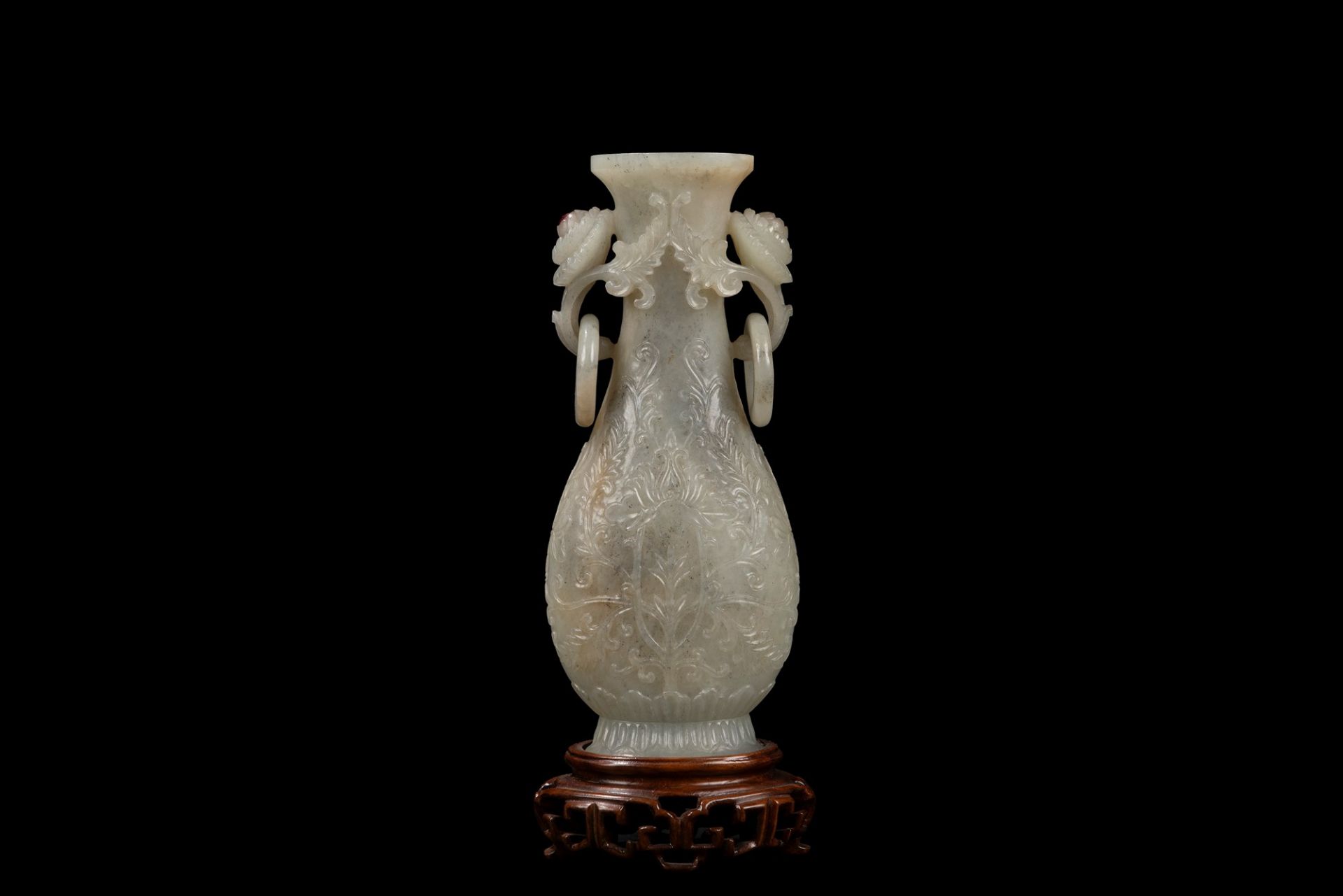 A CHINESE MUGHAL STYLE CARVED CELADON JADE ELONGATED VASE, China, Qing dynasty, 19th / 20th century