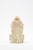 A WHITE JADE CARVED BOYS VASE AND COVER, China, Qing dynasty, 19th century