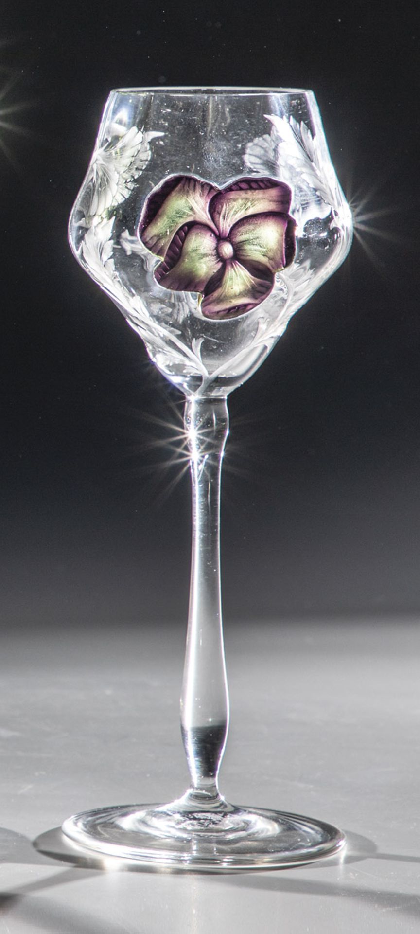 Wine glass with anemone blossom Moser, Karlovy Vary, 1905 Colorless optically blown glass. Marquetry