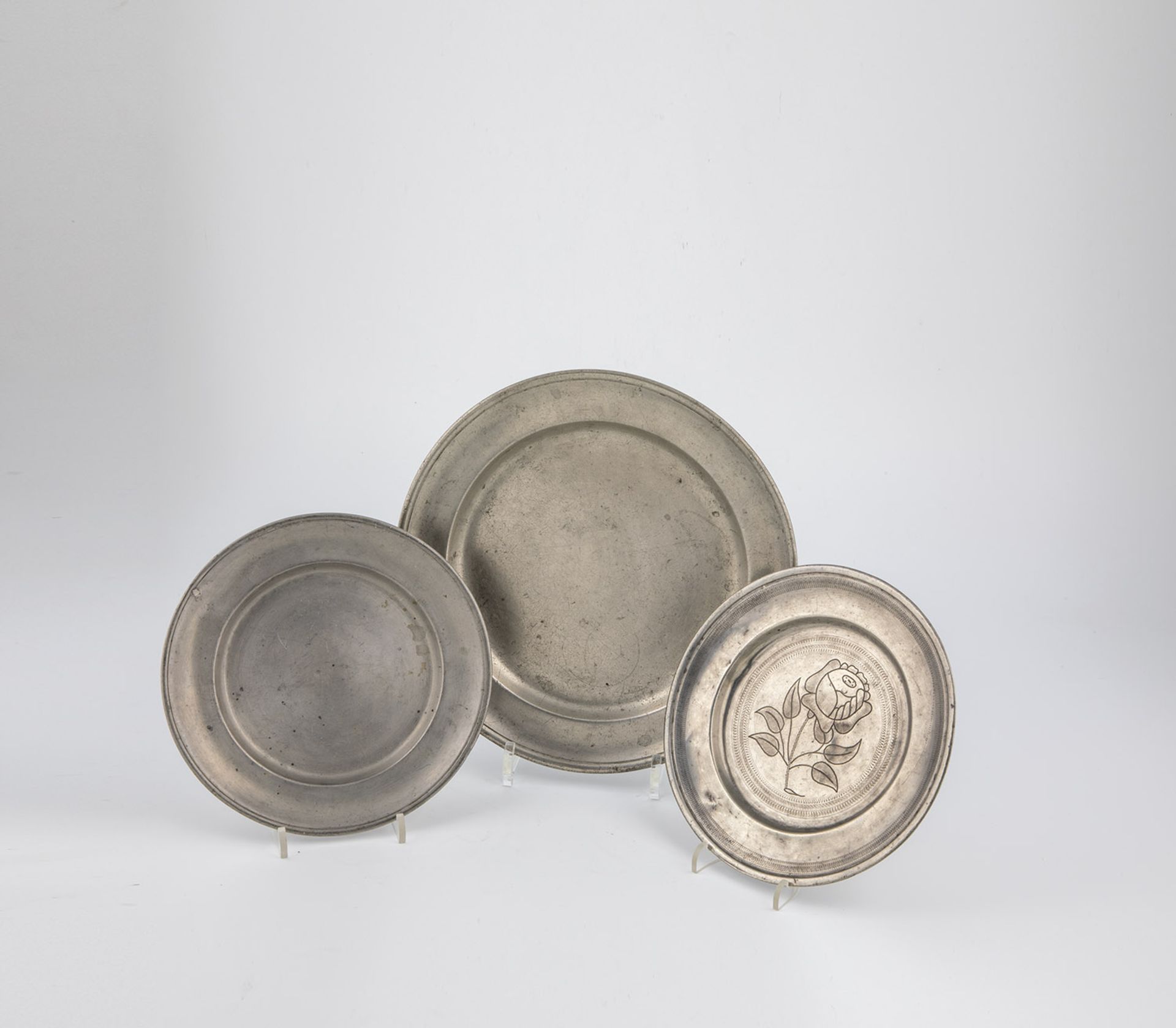 Three pewter plates