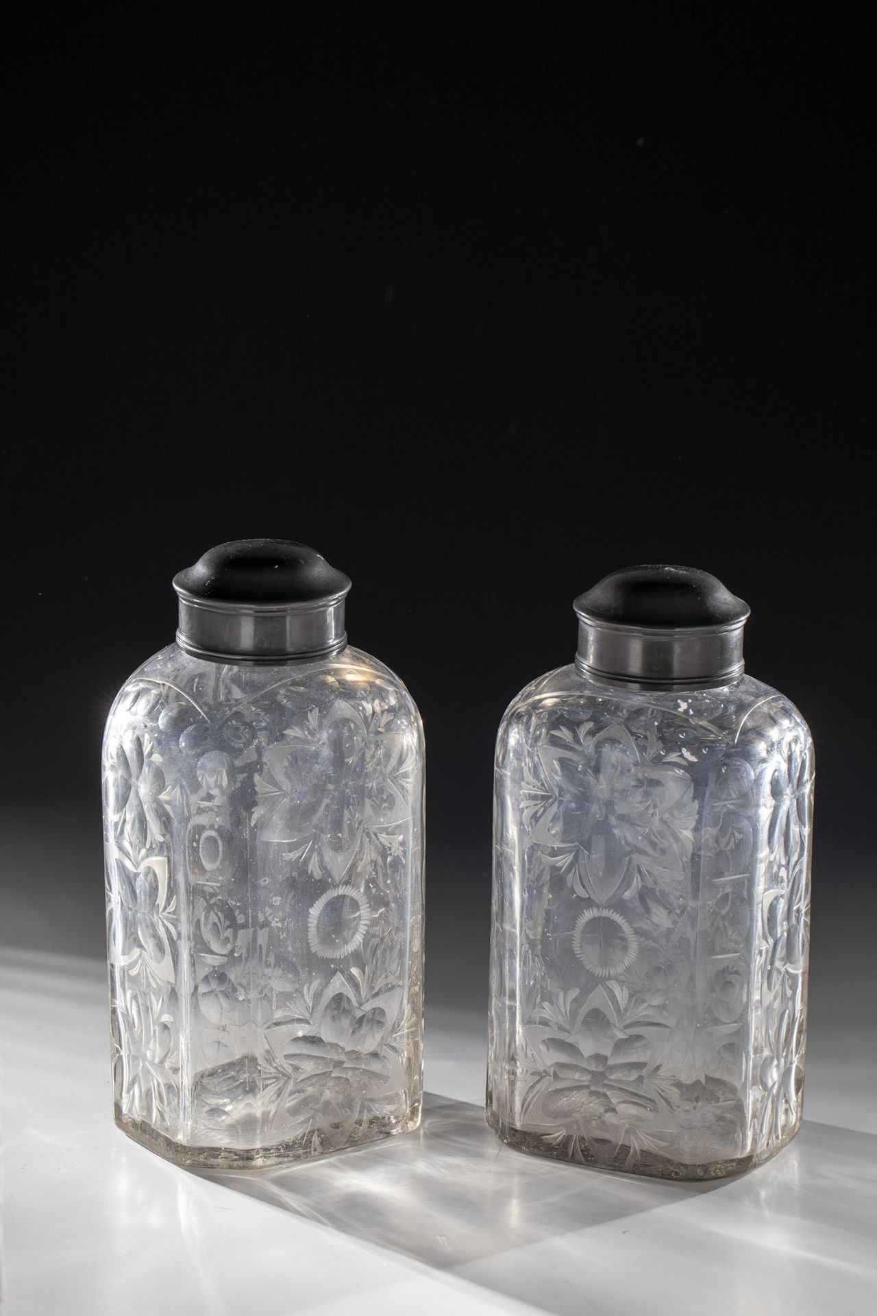 Pair of large bottles with tin screw caps
