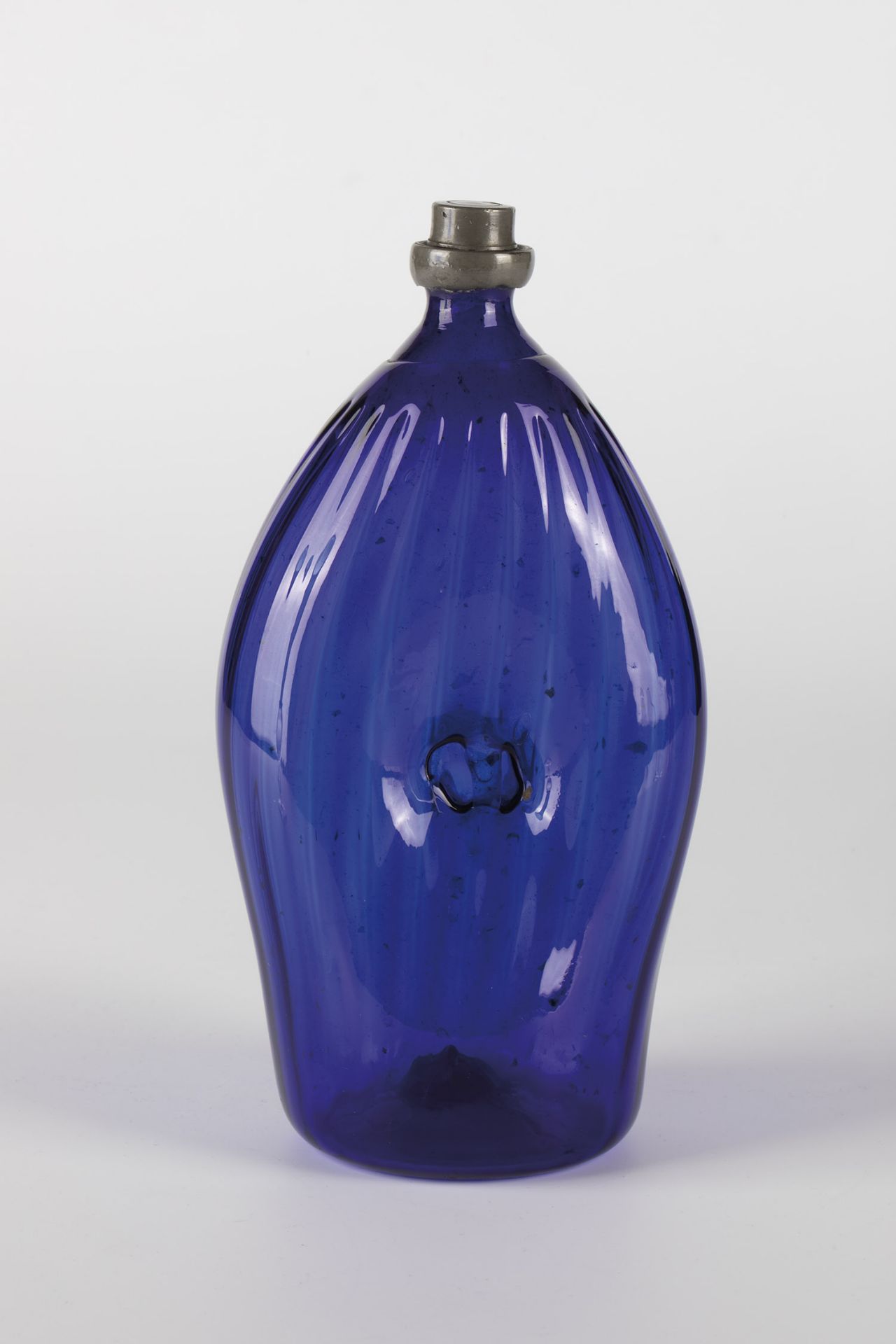 Umbilical bottle made of cobalt blue glass