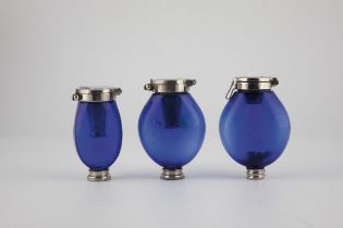 Three medicine bottles made of cobalt blue glass