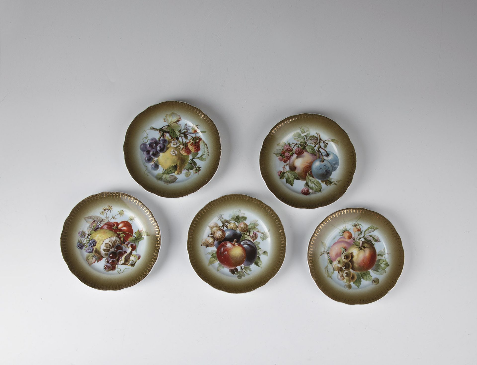 Five Porcelain Plates with Fruit Decor