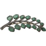 Leaf brooch with emeralds and diamonds