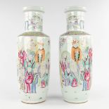 A pair of Chinese Famille Rose vases, decorated with wise men. 19th/20th C. (H:61 x D:21 cm)