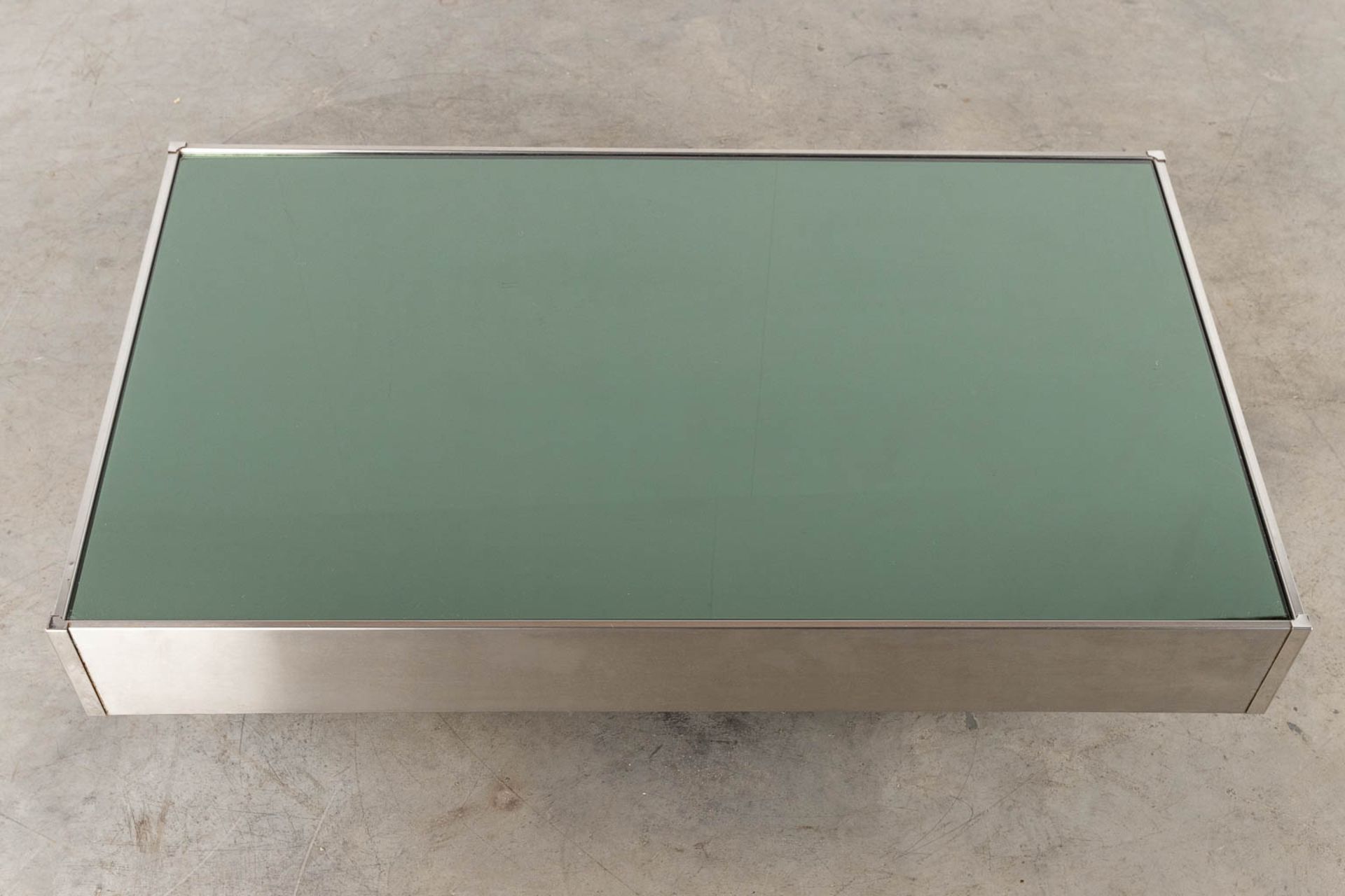 A coffee table, tinted glass and chrome, in the style of Willy Rizzo. (L:80 x W:120 x H:31 cm) - Image 9 of 10