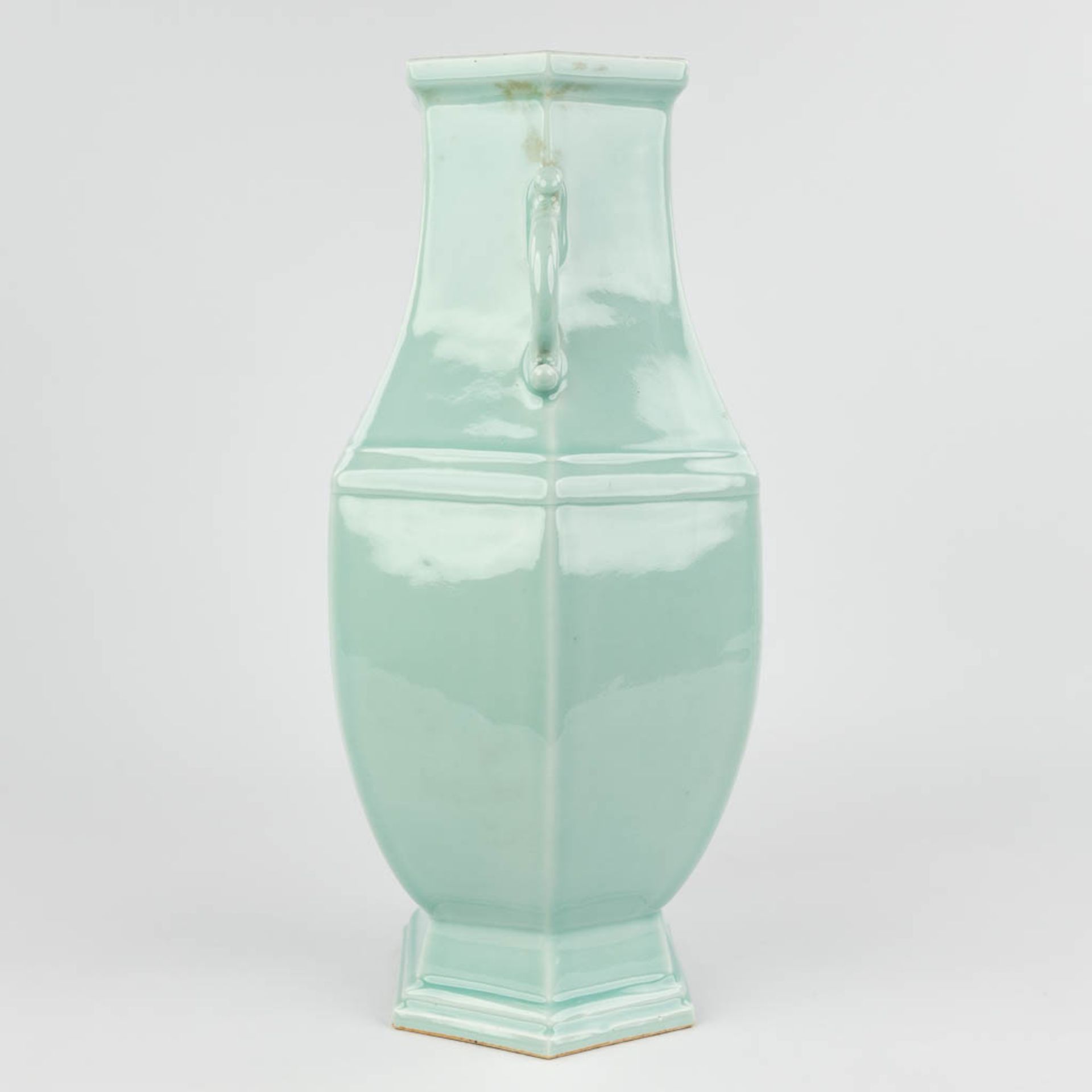 An antique Chinese celadon vase, Hexagonal, Qianlong mark and period. 18th C. (L:20 x W:26 x H:47 cm - Image 6 of 15