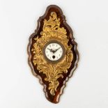 A small and decorative Cartell clock, gilt bronze in Louis XV style. Circa 1900. (L:4 x W:16 x H:31