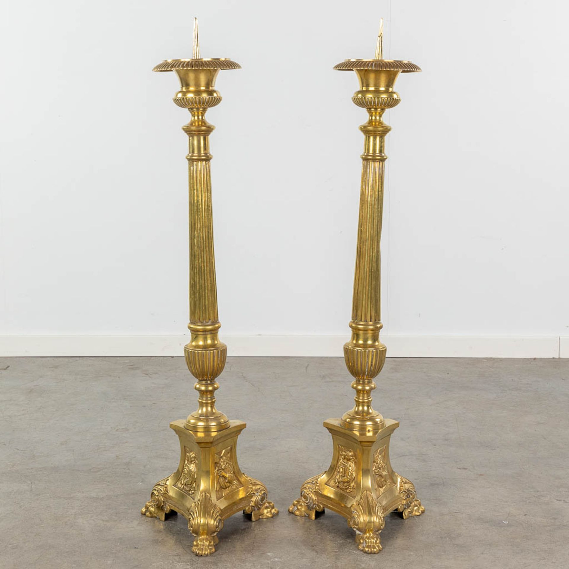 A pair of gold-plated and bronze church candle holders. Images of Joseph, Jesus and Mary. 19th C. (H - Image 3 of 12