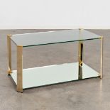 Cidue, A vintage coffee table, glass and gilt metal. Circa 1980. (L:43 x W:82 x H:40 cm)