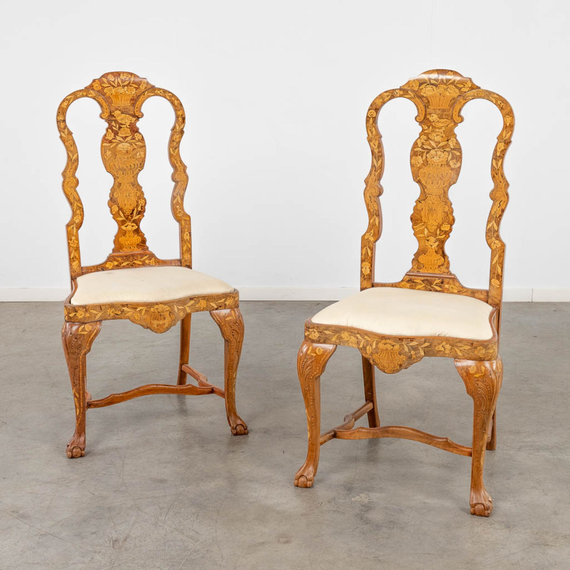 A pair of chairs with flower marquetry, 18th C. (L:46 x W:55 x H:112 cm)